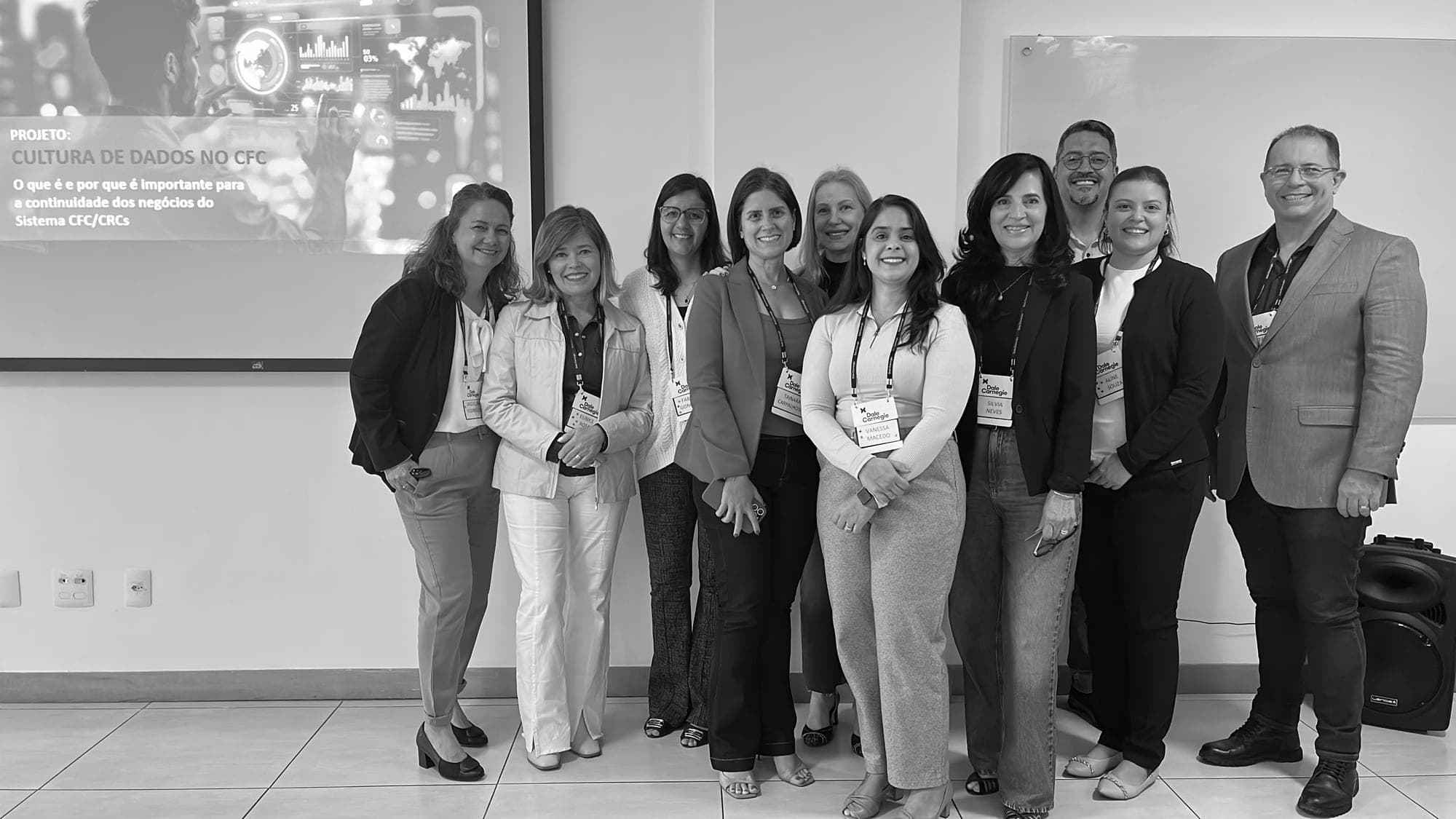 Equipe corporativa reunida durante um treinamento Dale Carnegie